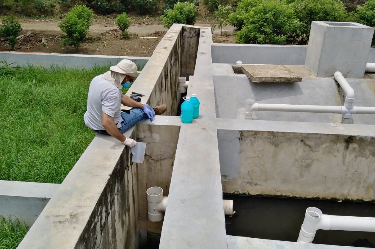 Taking samples at a wastewater treatment plant at the UASD in the Dominican Republic